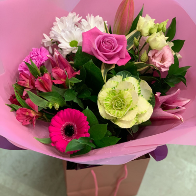 Sparkly Pink - Seasonal pink flowers  Hand tied and in water