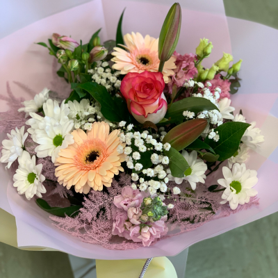 Summer Garden - A tasteful collection of seasonal flowers in coordinated wrapping. A beautiful fresh bouquet professionally arranged and delivered by the local florist. A perfect gift for any occasion.