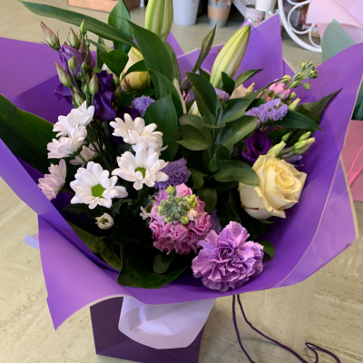 Cool Breeze - This classical stylish collection of flowers make this hand tied the perfect gift. Professionally arranged and delivered by a local florist. Flowers available for same day delivery when ordered before 2pm.