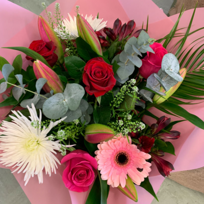 Sweet Romance - A bouquet of mixed beautiful roses is sure to create a lasting impression.