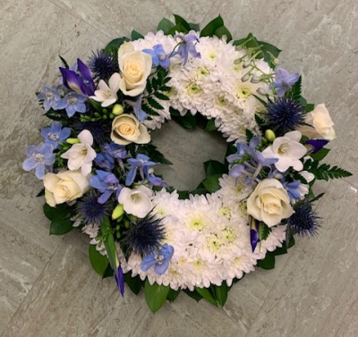 Blue And White Wreath - White Based Wreath With Blue And White Sprays

Other Colours Available