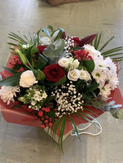 Romance - Beautifully Arranged Bouquet Of Red And White Flowers Including Lilies and Roses